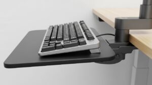 Side view of a keyboard tray using slight negative tilt to keep wrists neutral while typing